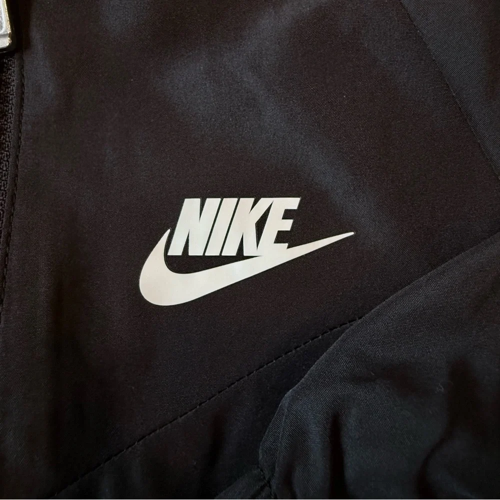 NWT Nike black Windrunner jacket size 12 months